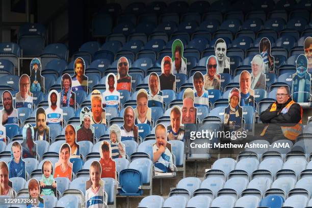 Cut out fans of QPR at Loftus Road stadium the home of QPR watching the Sky Bet Football League One - AFC Wimbledon v Shrewsbury Town match during...