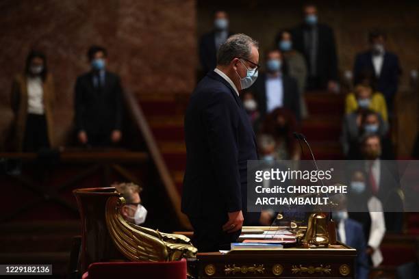 National Assembly president Richard Ferrand observes a minute of silence in homage to slain history teacher Samuel Paty, who was beheaded by an...