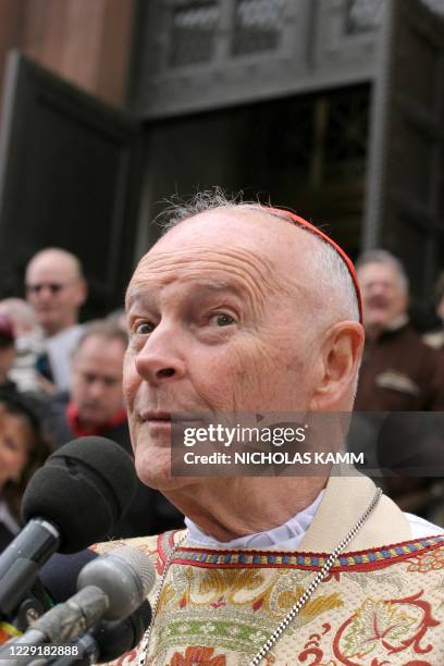 Cardinal Theodore McCarrick, Archbishop of Washington speaks to reporters outside the Cathedral of Saint Matthew the Apostle in Washington, DC, 03...