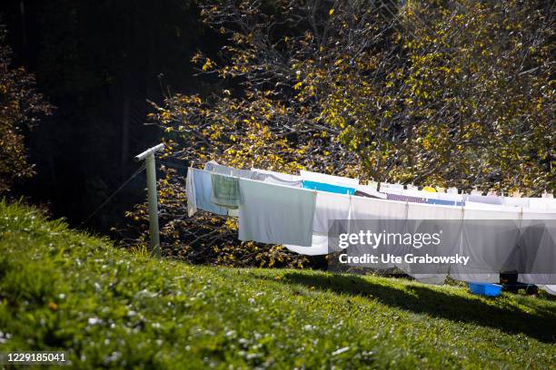 In this photo illustration a laundry line in a landscape on October 12, 2020 in St. Peter, Italien.
