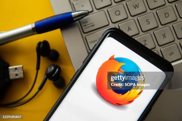 In this photo illustration a Mozilla Firefox logo seen displayed on a smartphone.