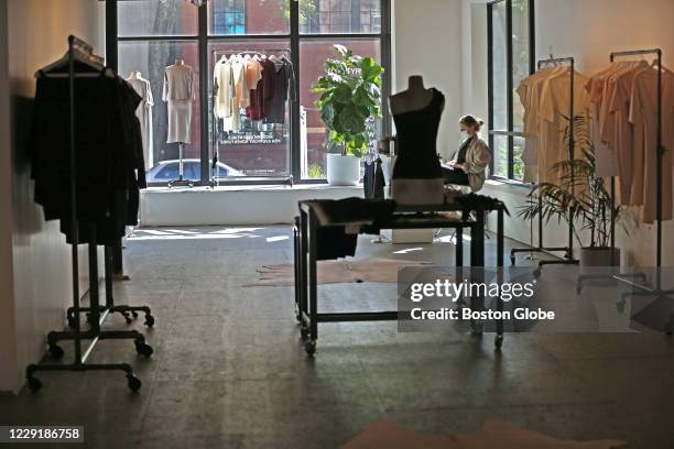 Mary Bamrick, marketing co-ordinator, works at PARIDAEZ on Newbury Street in Boston on Oct. 8, 2020. While the COVID-19 pandemic has been a massive...