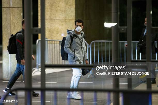 Liverpool's Egyptian forward Mohamed Salah arrives at the Okura Hotel in Amsterdam, the Netherlands, on October 20 on the eve of the UEFA Champions...