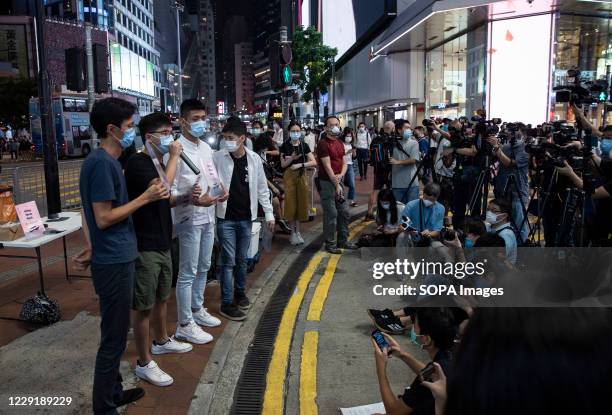 Pro-democracy activist Joshua Wong and other activists holding 'Bring Them Back' transparent cards, speaking to media during the rally. Pro democracy...