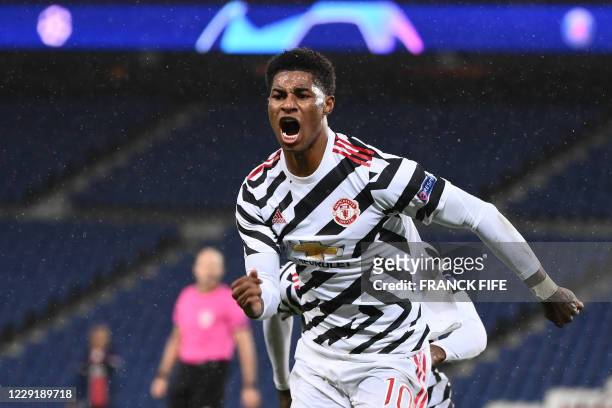 Manchester United's English Forward Marcus Rashford celebrates after scoring a goal during the UEFA Europa League Group H first-leg football match...