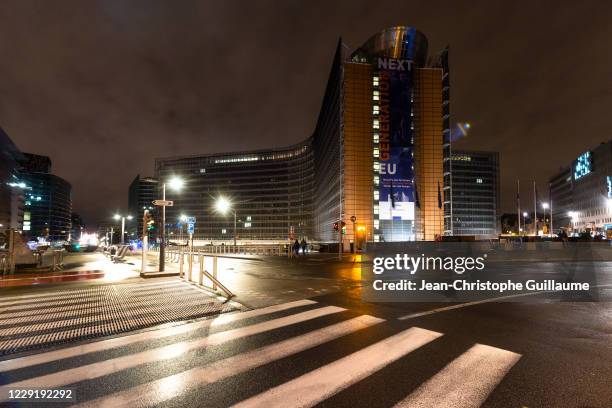 European flags fly in front of the Berlaymont. The building of the European Parliament on October 20, 2020 in Brussels, Belgium. Bars and restaurants...