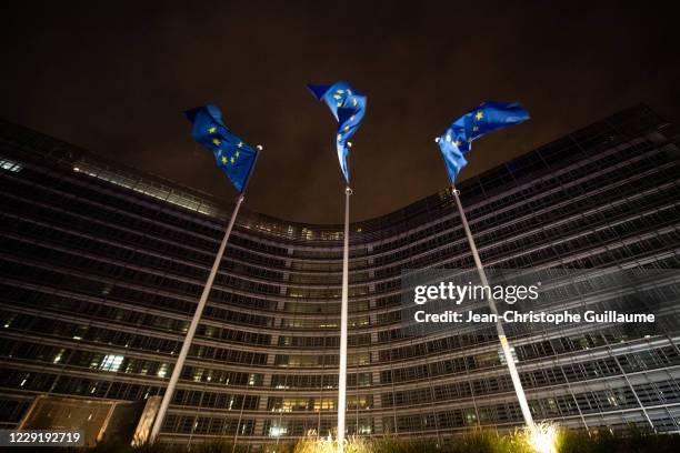 European flags fly in front of the Berlaymont. The building of the European Parliament on October 20, 2020 in Brussels, Belgium. Bars and restaurants...