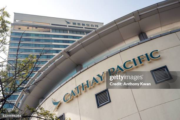 Cathay Pacific signage is displayed on Cathay Pacific City building, the headquarters of Cathay Pacific Airways, on October 21, 2020 in Hong Kong,...