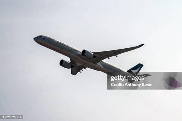 Cathay Pacific passenger jet takes off from Hong Kong International Airport on October 21, 2020 in Hong Kong, China. Hong Kong airline Cathay Pacific...