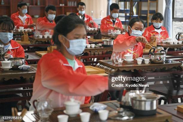 Intern Tea Making How To Make Tea Photos and Premium High Res Pictures - Getty Images