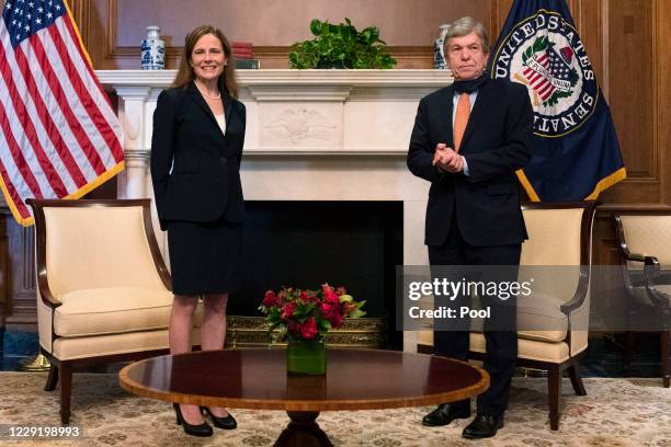 Supreme Court nominee Judge Amy Coney Barrett meets with Sen. Roy Blunt, on October 21, 2020 in Washington, DC. Senate Republicans are looking to...