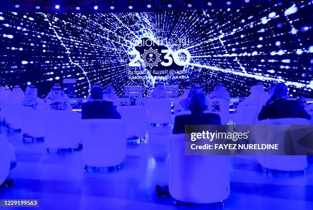 Guests attend the Global AI 2020 Summit in the Saudi capital Riyadh on October 21, 2020. - The summit, organised by the Saudi Data & AI Authority and...