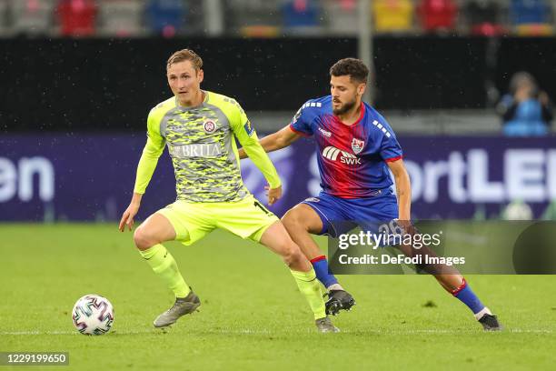 Marc Lais of SV Wehen Wiesbaden and Dave Gnaase of KFC Uerdingen battle for the ball during the 3. Liga match between KFC Uerdingen and SV Wehen...