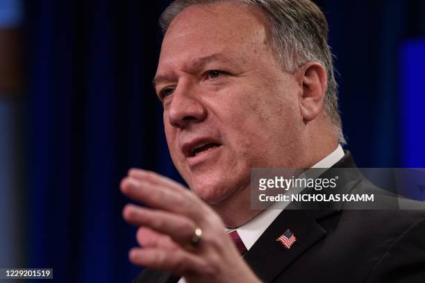 Secretary of State Mike Pompeo speaks at a press conference at the State Department in Washington, DC, on October 21, 2020. - US Secretary of State...