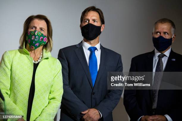 From left, Sens. Shelley Moore Capito, R-W.Va., Ben Sasse, R-Neb., and Thom Tillis, R-N.C., are seen during a news conference a day before the Senate...