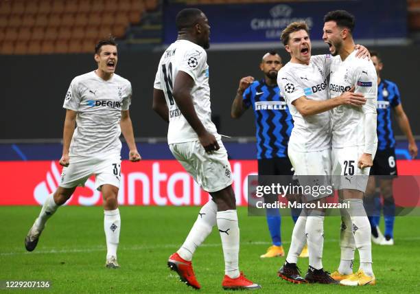 Ramy Bensebaini of Borussia Monchengladbach celebrates his goal with his team-mates during the UEFA Champions League Group B stage match between FC...