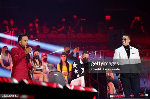 Pictured: Luis Fonsi and Daddy Yankee accept an award on stage at the BB&T Center in Sunrise, FL on October 21, 2020 --