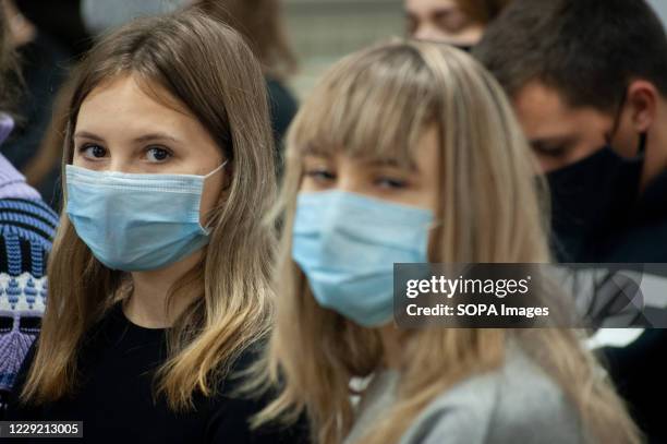 Students wearing face masks as a preventive measure attend a business master class at the business center of Tambov. The topic of discussion was...