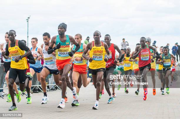 Joshua Cheptegei of Uganda, Guye Idemo Adola of Ethiopia, Jacob Kiplimo of Uganda, Kibiwott Kandie of Kenya in action during 2020 IAAF World Half...