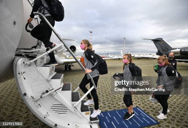 Dusseldorf , Germany - 22 October 2020; Republic of Ireland players, from left, Megan Connolly, Grace Moloney and Courtney Brosnan board their...