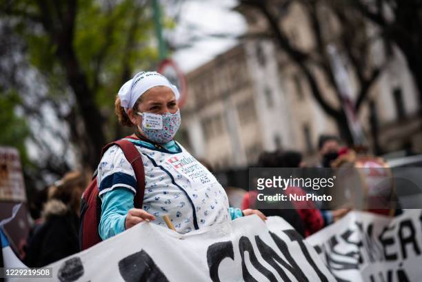 Health personnel claim for the professionalization of their work, in the framework of the Coronavirus 19 pandemic during a protest in Buenos Aires,...