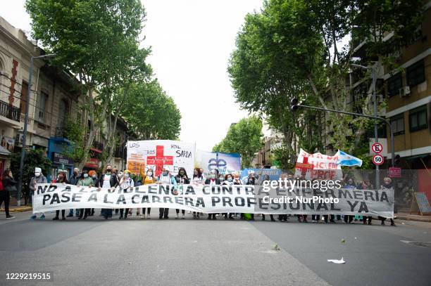 Health personnel claim for the professionalization of their work, in the framework of the Coronavirus 19 pandemic during a protest in Buenos Aires,...