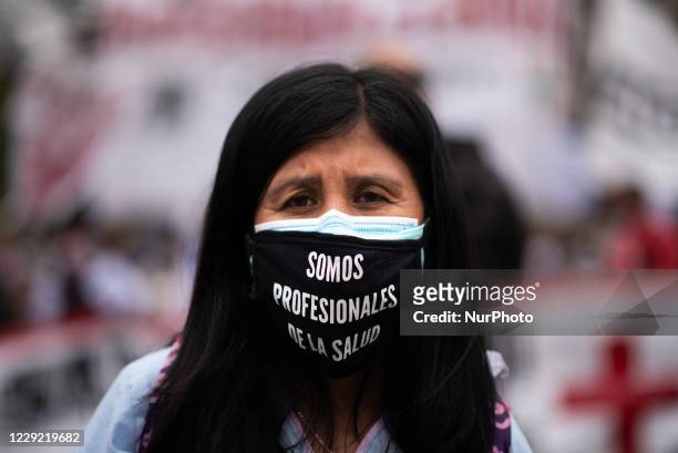 Health personnel claim for the professionalization of their work, in the framework of the Coronavirus 19 pandemic during a protest in Buenos Aires,...