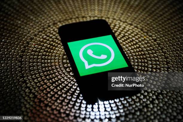 WhatsApp logo displayed on a phone screen is seen in this illustration photo taken on October 21, 2020 in Krakow, Poland.