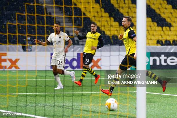 Roma's Brazilian defender Bruno Peres shoots and scores a goal during the UEFA Europa League Group A first-leg football match between Young Boys and...