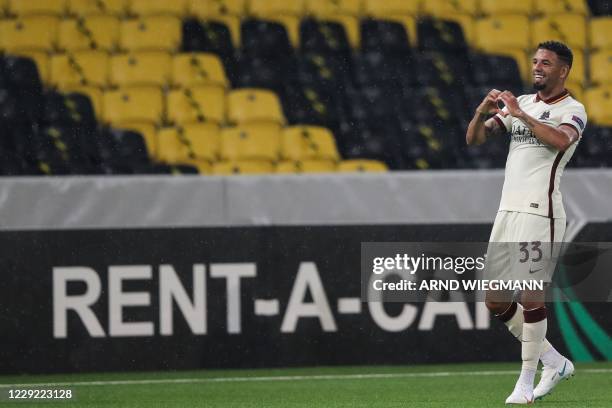 Roma's Brazilian defender Bruno Peres celebrates after scoring a goal during the UEFA Europa League Group A first-leg football match between Young...