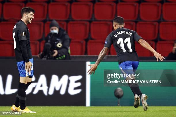 Darwin Machis of Granada celebrates after scoring a goal during the UEFA Europa League group E football match between PSV Eindhoven and Granada CF at...