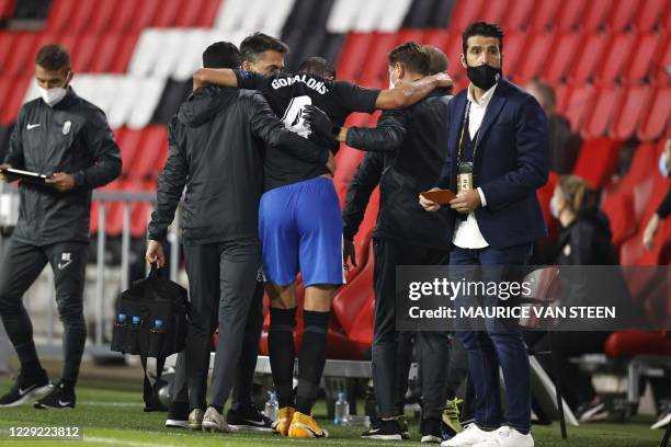 Maxime Gonalons of Granada leaves the field injured during the UEFA Europa League group E football match between PSV Eindhoven and Granada CF at the...