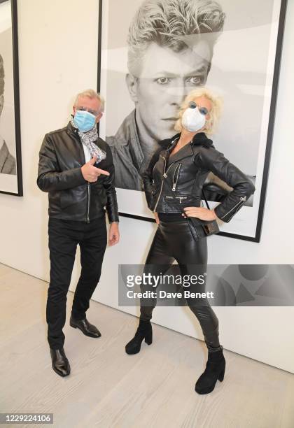 Tony McGee and Alison Jackson attend a private view of "David Bowie 20/20 Vision", a collection of photographs by Tony McGee, at The Saatchi Gallery...