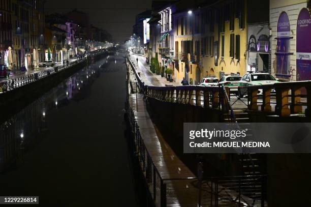 General view shows the empty Navigli district in the Navigli district in southern Milan on October 22 after the closing of the bars and restaurants....