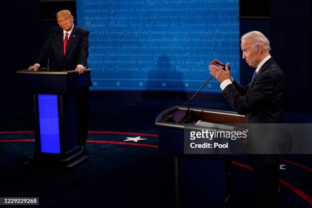 Democratic presidential candidate former Vice President Joe Biden answers a question as President Donald Trump listens during the second and final...