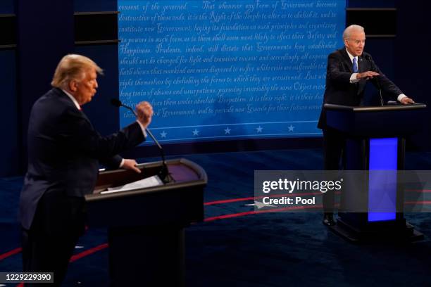 Democratic presidential candidate former Vice President Joe Biden answers a question as President Donald Trump listens during the second and final...