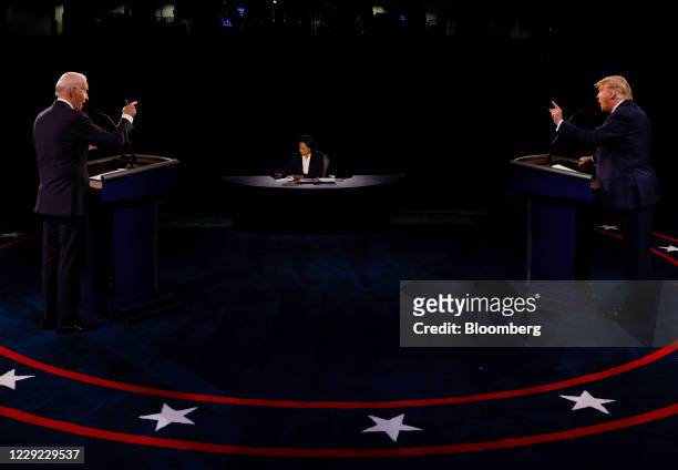 President Donald Trump, right, and Joe Biden, 2020 Democratic presidential nominee, speak during the U.S. Presidential debate at Belmont University...