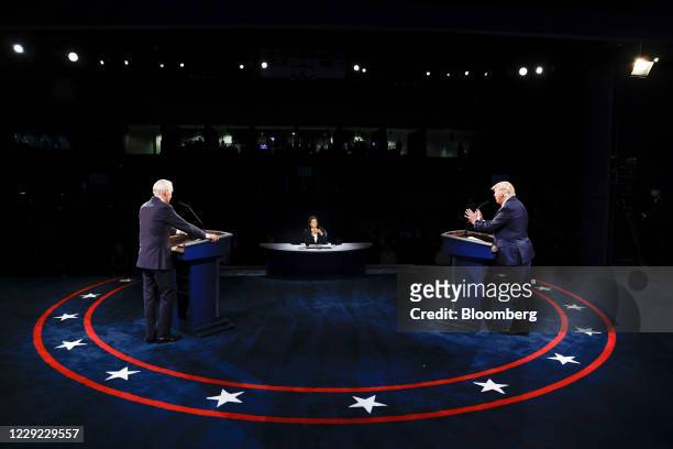 President Donald Trump speaks as Joe Biden, 2020 Democratic presidential nominee, left, listens during the U.S. Presidential debate at Belmont...
