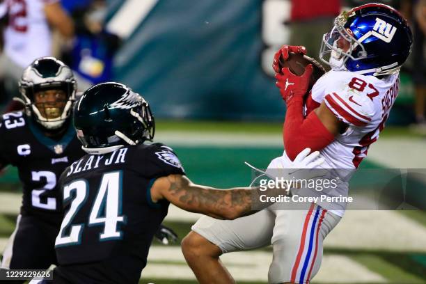 Sterling Shepard of the New York Giants hauls in a touchdown reception against Darius Slay and Rodney McLeod of the Philadelphia Eagles during the...
