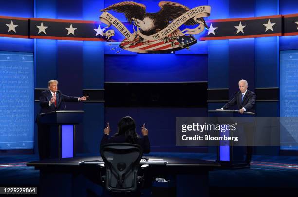 President Donald Trump speaks as Joe Biden, 2020 Democratic presidential nominee, right, listens during the U.S. Presidential debate at Belmont...