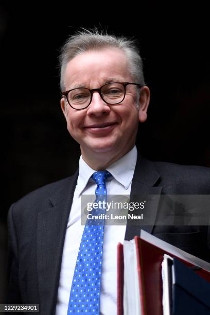 Chancellor of the Duchy of Lancaster, Michael Gove, is seen leaving the Foreign and Commonwealth Office and walking to Downing Street on October 23,...