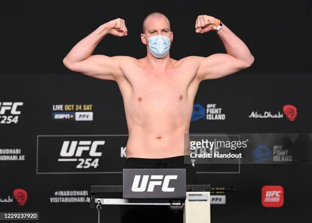In this handout image provided by UFC, Stefan Struve of the Netherlands poses on the scale during the UFC 254 weigh-in on October 23, 2020 on UFC...