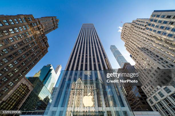Apple flagship retail store in Fifth in New York City with the Iconic glass cube design from Peter Bohlin that received multiple architectural and...