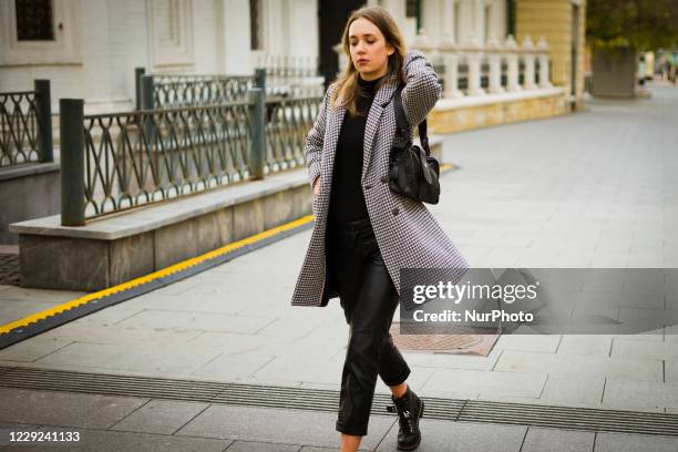 People take part in the Street Style Mercedes Benz-Fashion Week Russia Spring/Summer 2021 on October 23, 2020 in Moscow, Russia.