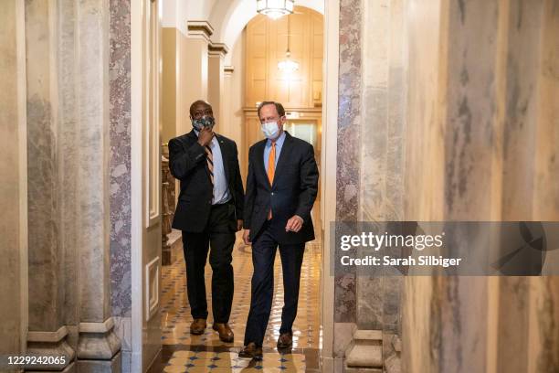 Senators Tim Scott and Pat Toomey depart from the U.S. Capitol following a Senate vote ahead of Monday's vote on the nomination of Judge Amy Coney...
