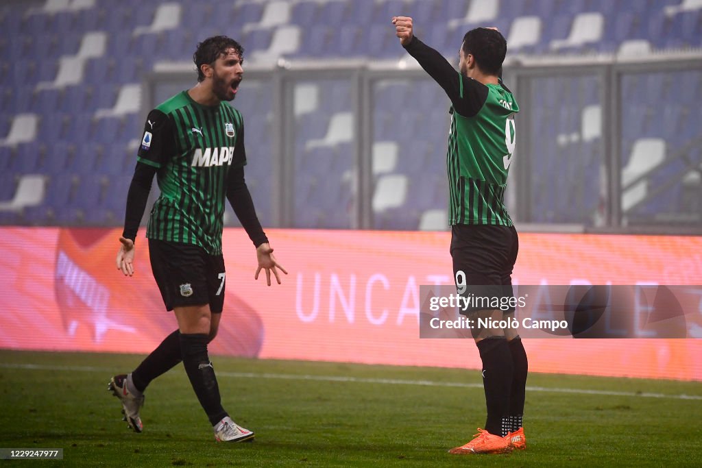 Francesco Caputo (R) of US Sassuolo celebrates with Manuel...