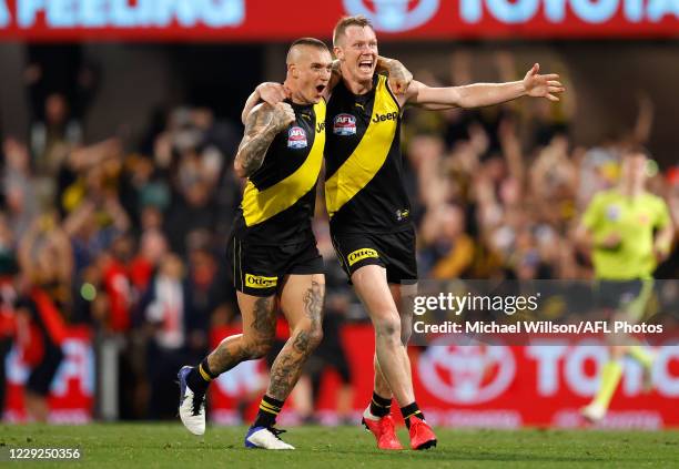 Dustin Martin of the Tigers and Jack Riewoldt of the Tigers celebrate as the final siren sounds during the 2020 Toyota AFL Grand Final match between...