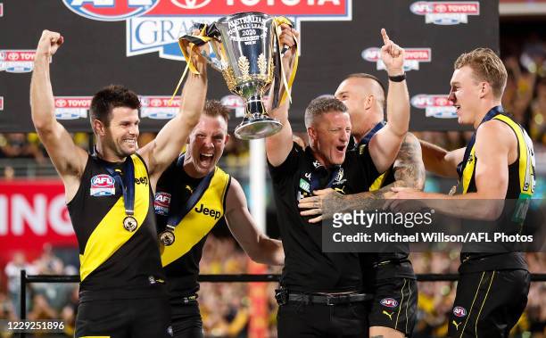 Trent Cotchin of the Tigers and Damien Hardwick, Senior Coach of the Tigers hold the cup aloft during the 2020 Toyota AFL Grand Final match between...