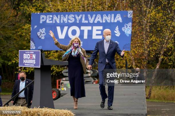 Democratic presidential nominee Joe Biden and his wife Dr. Jill Biden arrive for a drive-in campaign rally at Bucks County Community College on...