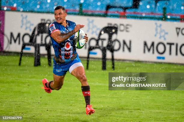 Bulls' Embrose Papier runs to score a try the third round match in the South African Super Rugby Unlocked competition between the Vodacom Bulls and...